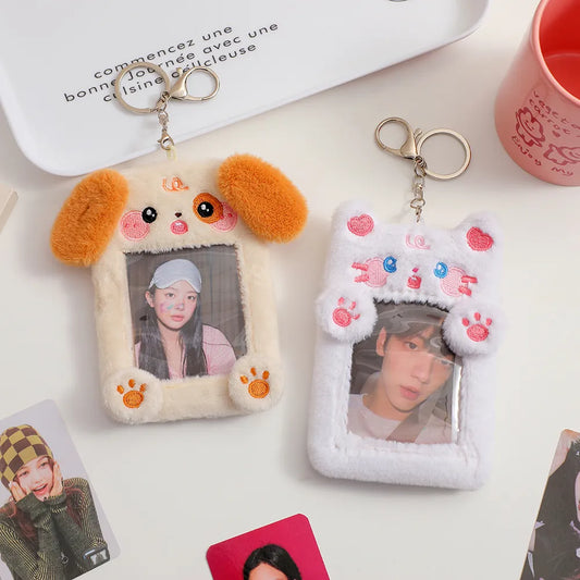 Plush dog photo card holder keychain with beige fur, orange ears, and photo window