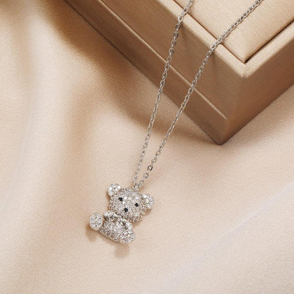 Teddy bear pendant necklace with silver-toned chain and glitter teddy bear pendant