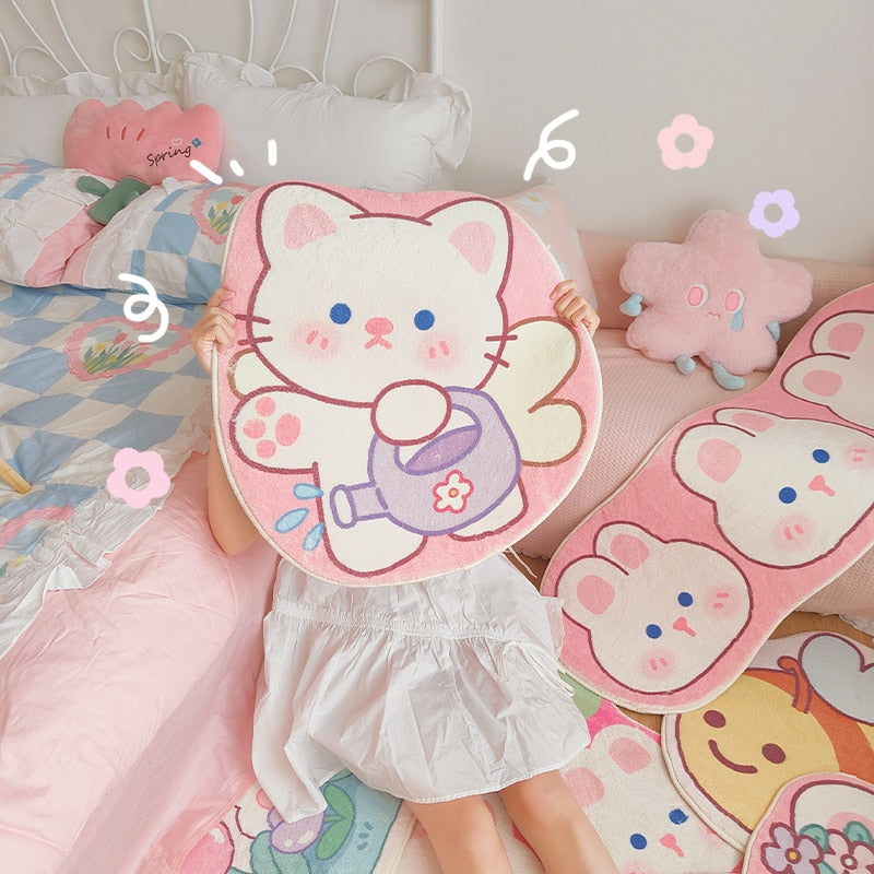 Set of round-corner cat face area rugs in pastel pink and purple with flowers