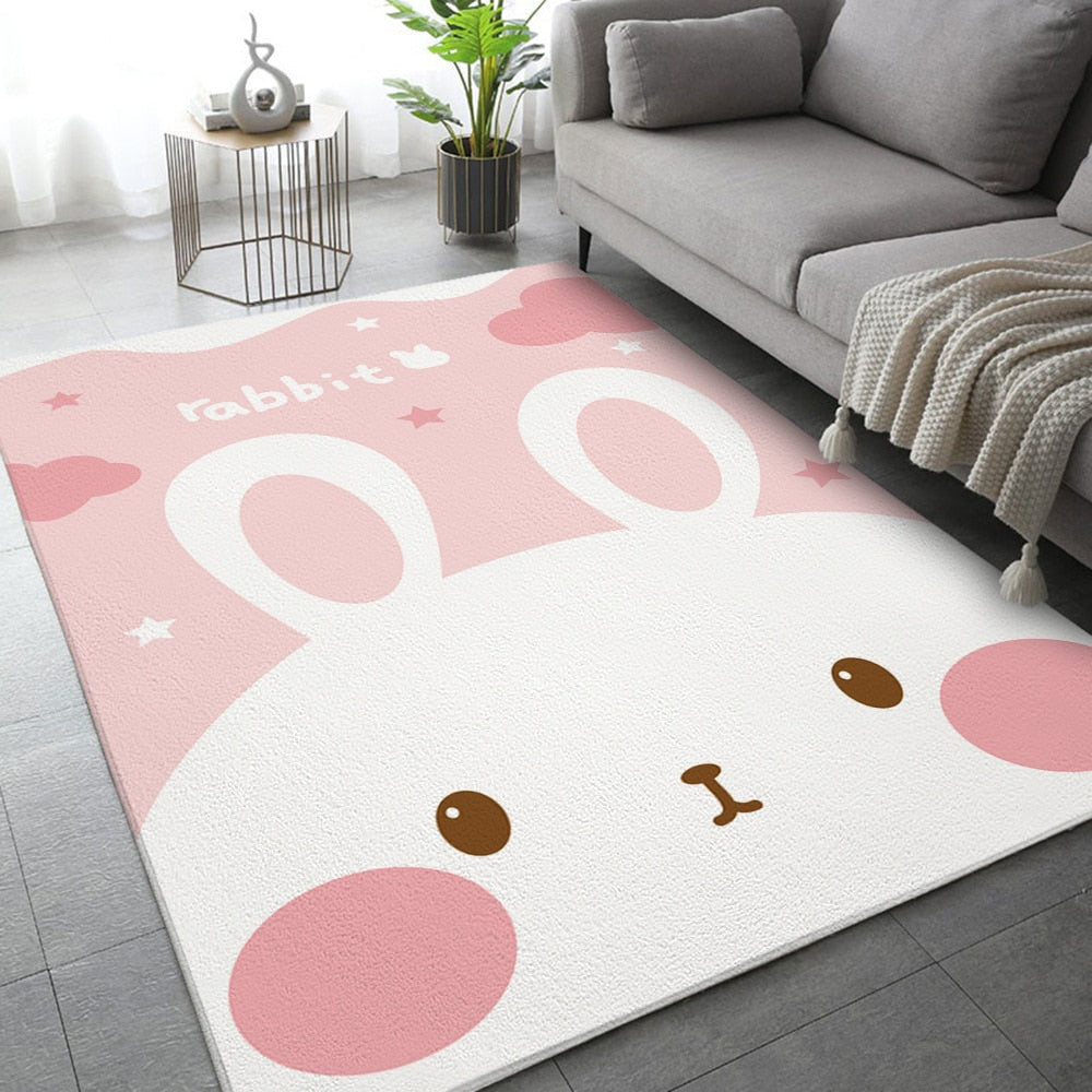 White and pink rabbit area rug with big oval ear prints and small paw accents