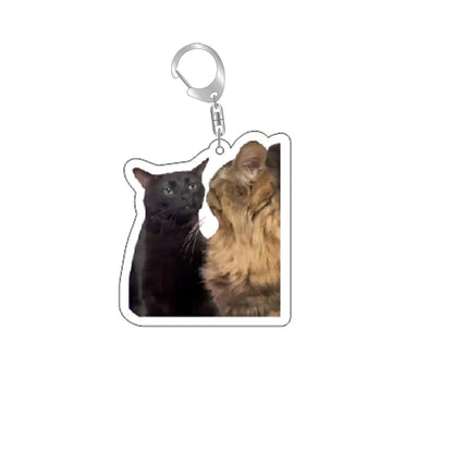 Cat keychain with silver ring and clip; black and brown cats side by side.