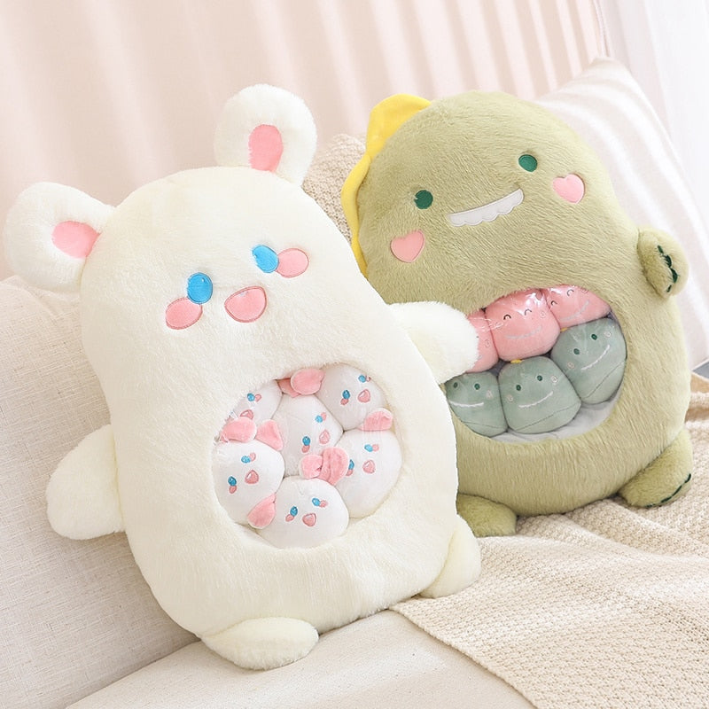 Plush animal shaped pillows: white bear pillow and light green avocado pillow on couch