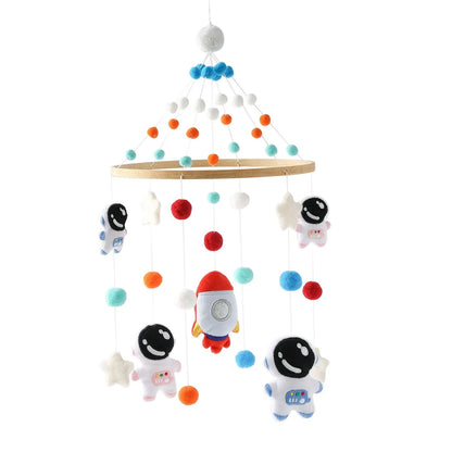 Baby crib mobile with astronaut and space-themed hanging plush balls and stars