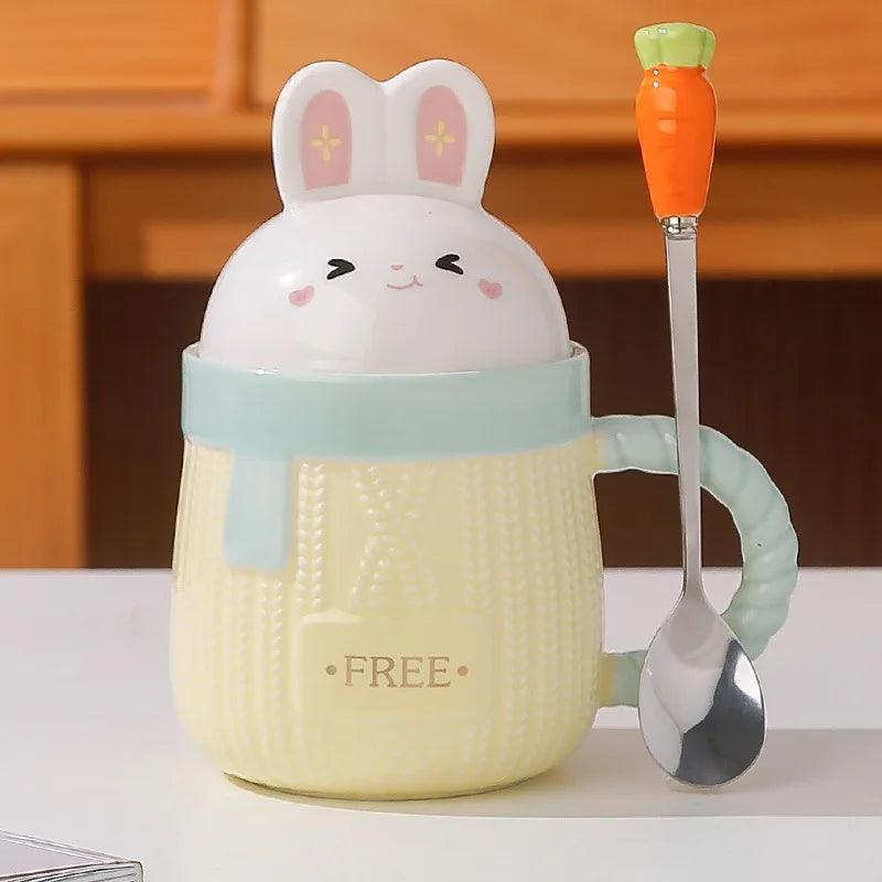 Yellow bunny ceramic mug with rabbit lid, textured body, and 'FREE' text.