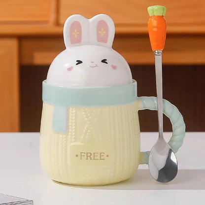Yellow bunny ceramic mug with rabbit lid, textured body, and 'FREE' text.