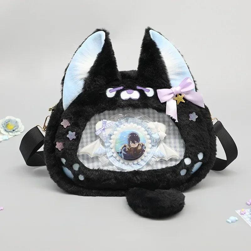 Black cat plush ita bag with light blue eye window patch and purple bow