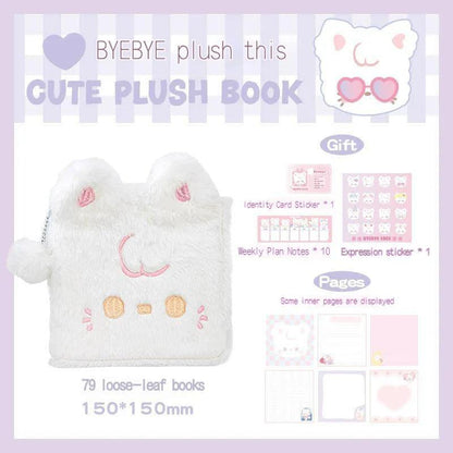 White plush cat notebook with fuzzy cover and stitched smiling face
