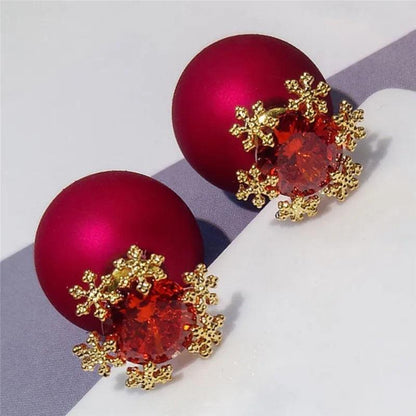 Red crystal ornament earrings with gold snowflake frame and matching ball-like studs