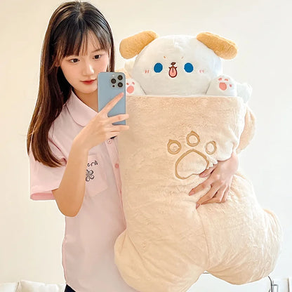 Large cream plush animal with paw prints on front and tan paw-shape hood