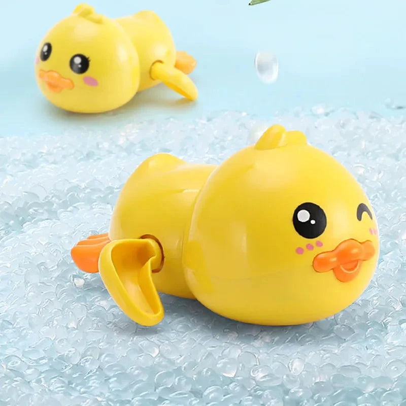 Yellow duck bath toy pair with bubbles and water splashes
