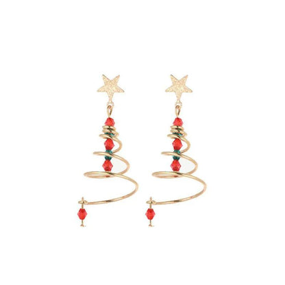 Star and spiral drop earrings with gold hooks and red bead dangle accents