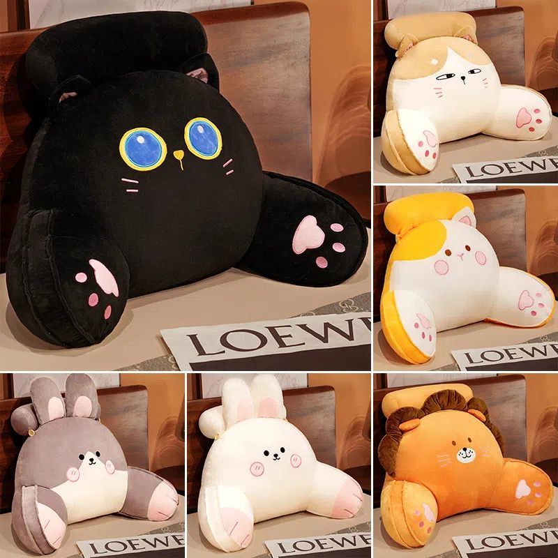 Set of animal reading pillows in black, white, and orange plush with cute faces