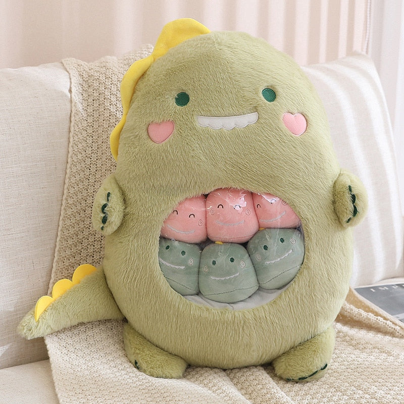 Plush animal shaped pillow in light green, avocado face with smiling mouth and rosy cheeks