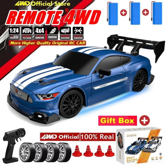 Blue 4WD RC drift car with black rear wing and front bumper, remote-ready racing vehicle