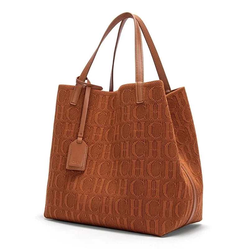 Large knitted tote bag with allover monogram pattern and two top handles, brown