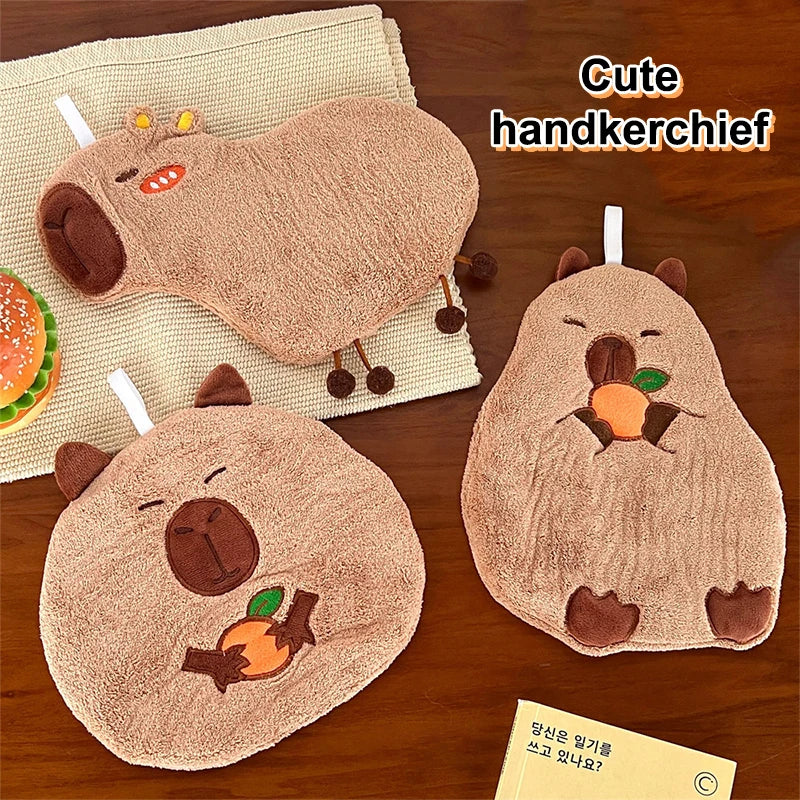 Capybara cotton hand towel with hanging loop, plush bear-like face and carrot embroidery