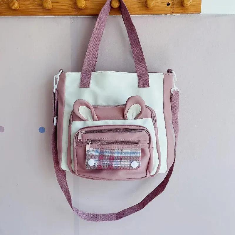Pink bunny-ear tote shoulder bag with front plaid pocket and adjustable shoulder strap