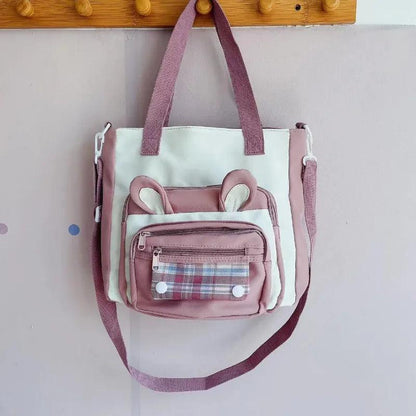 Pink bunny-ear tote shoulder bag with front plaid pocket and adjustable shoulder strap