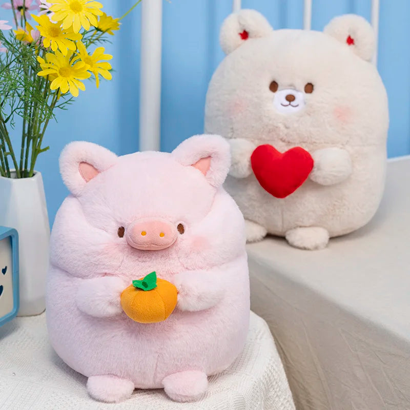 Pink pig plush with orange carrot accessory and small facial features, sitting.