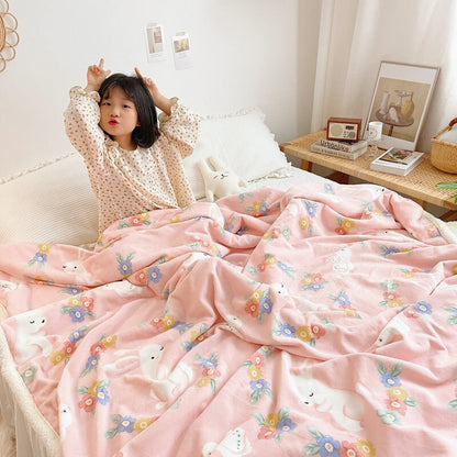 Lamb fleece blanket with pink pastel animal print and white sherpa border