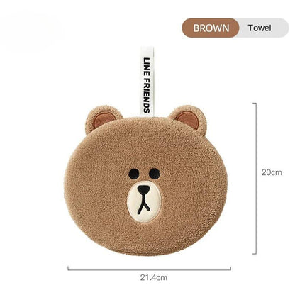 Brown round teddy bear hand towel with stitched bear face and ear details