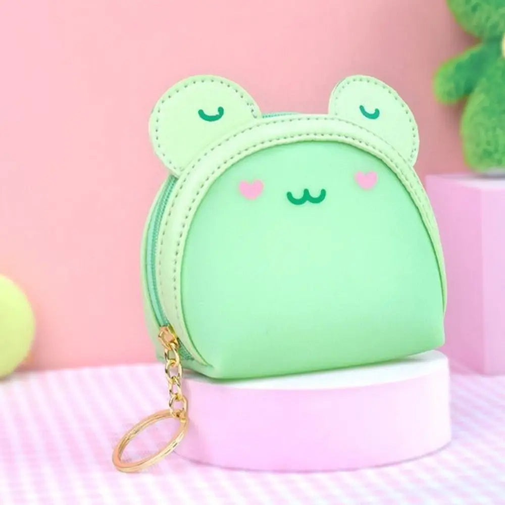 Mint green frog-face coin purse with pink hearts and gold key ring