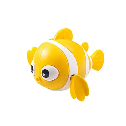 Yellow clown fish bath toy with white stripe, cartoon eyes, and side fins.