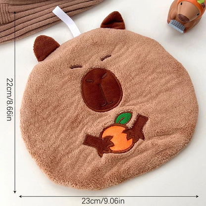 Capybara cotton hand towel with hanging loop, oval plush face with orange and green embroidery