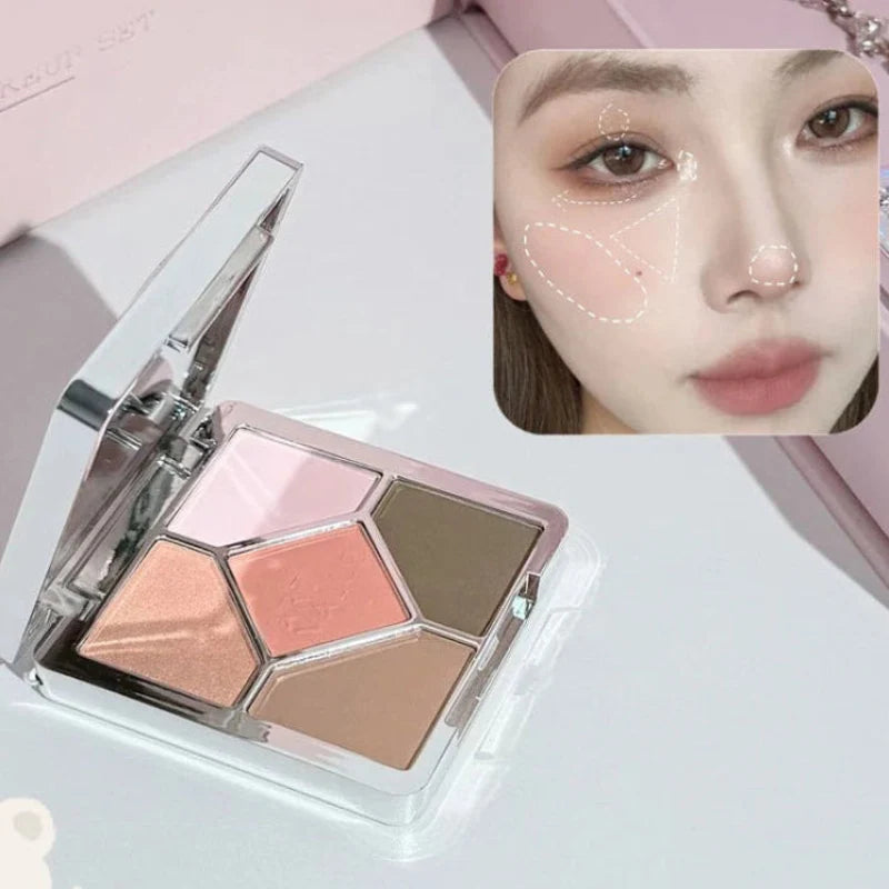 Three-tone eyeshadow palette compact with rose and nude shades in a clear case