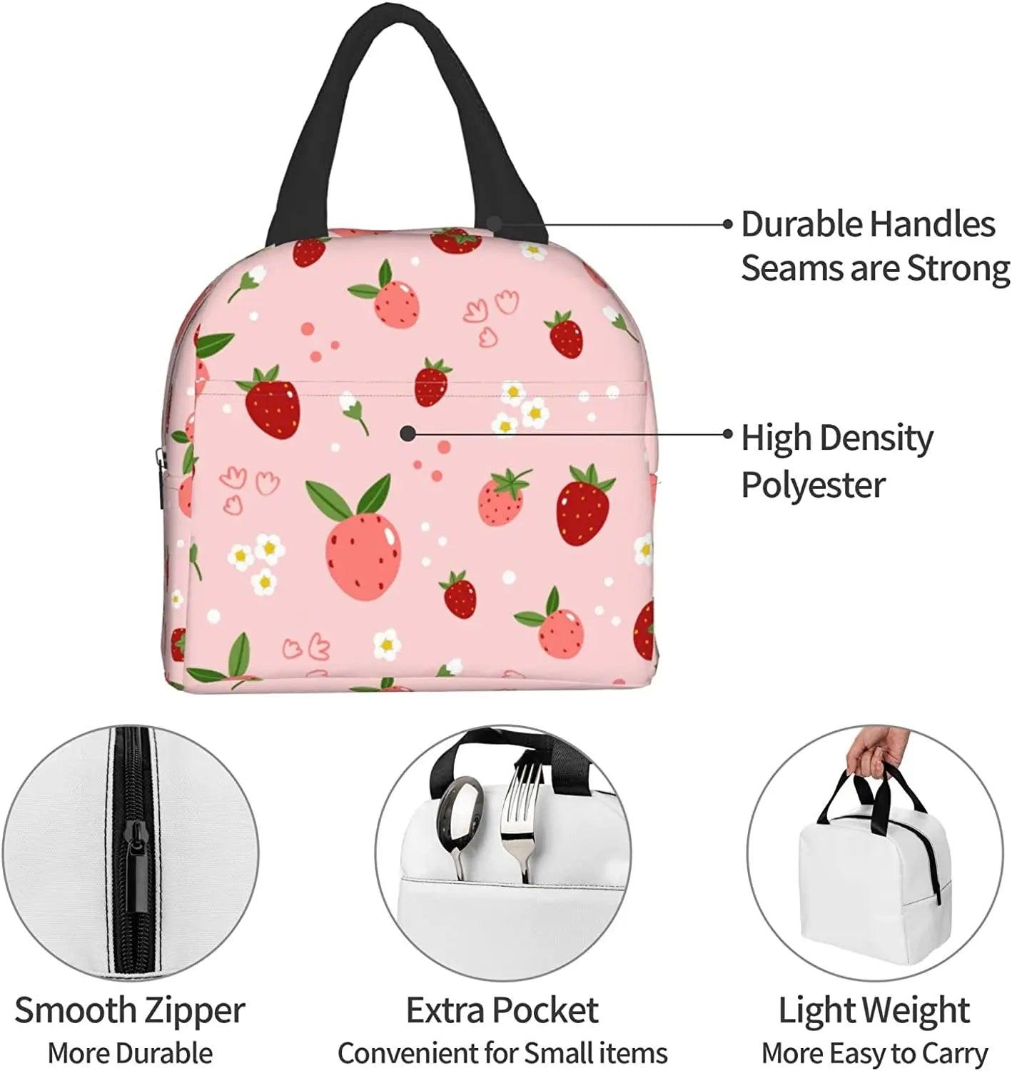 Pink insulated lunch bag with strawberry print, black top handle and zipper front