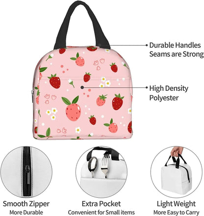 Pink insulated lunch bag with strawberry print, black top handle and zipper front