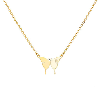 Butterfly pendant necklace with letter S, gold-tone chain