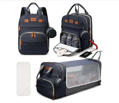 Navy diaper bag backpack with foldable baby bed, bottle pockets, and USB interface.