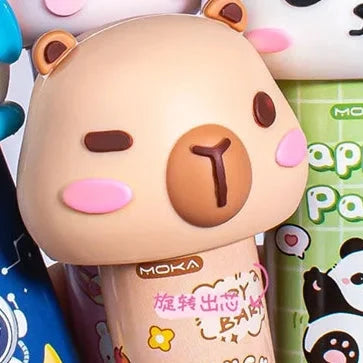 Close-up capybara PVA glue stick with rounded cap and pink cheek accents