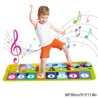 Kids piano dance mat on floor with numbered color keys and animal graphics
