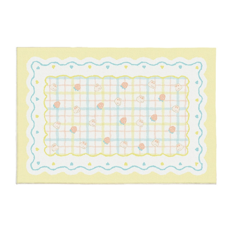 Pastel plush area rug with light blue stitched border and small bear icons on pale yellow