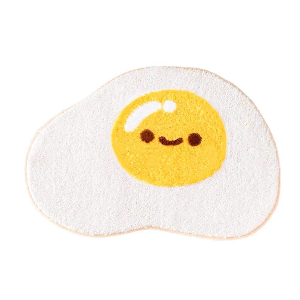 Cute egg bath mat rug, centered yellow smiling egg face on light gray oval