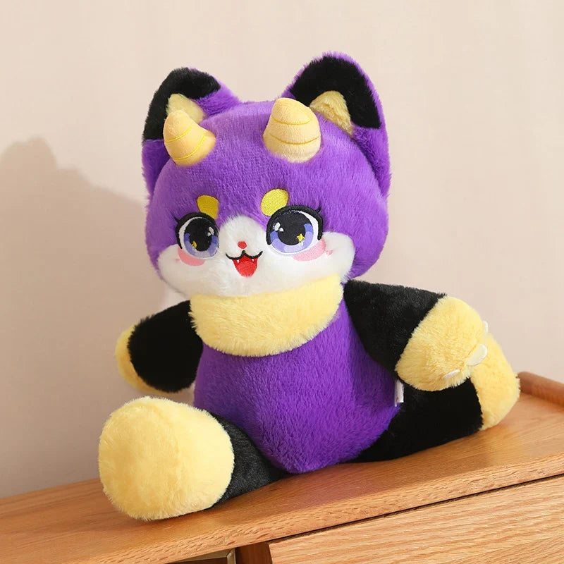 Dragon cat plushie in purple with yellow horns, big eyes, soft stuffed body