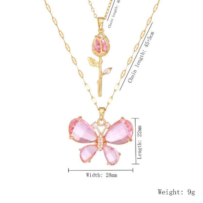 Gold-tone butterfly rose necklace with pink butterfly flower pendant and pink rose teardrop charm