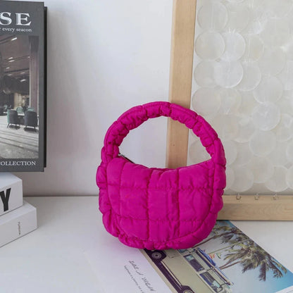 Mini quilted puffer circle tote bag with short handles, magenta pink