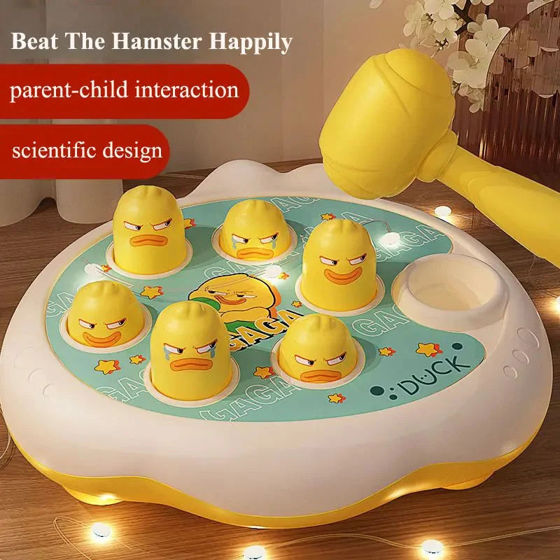 Duck-themed toddler shape hammer toy with smiling duck pieces on a round base