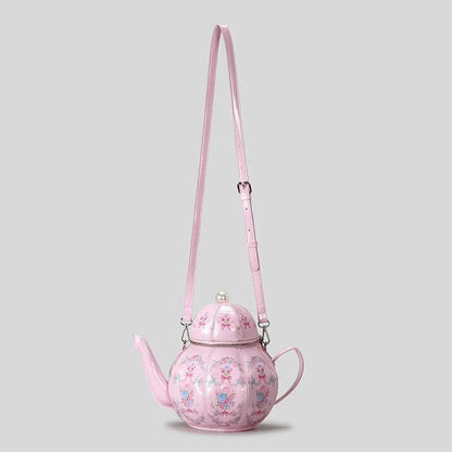 Pink teapot-shaped mini bag with long shoulder strap and pearl beaded handle