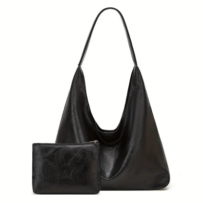 Black shoulder tote bag with large open top and matching front zip pouch