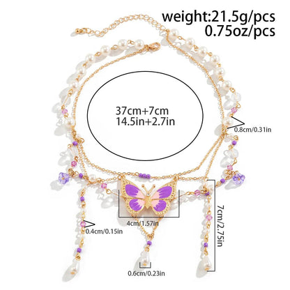 Butterfly imitation pearl multi-layer necklace with butterfly pendant, pearl strands, and tassels