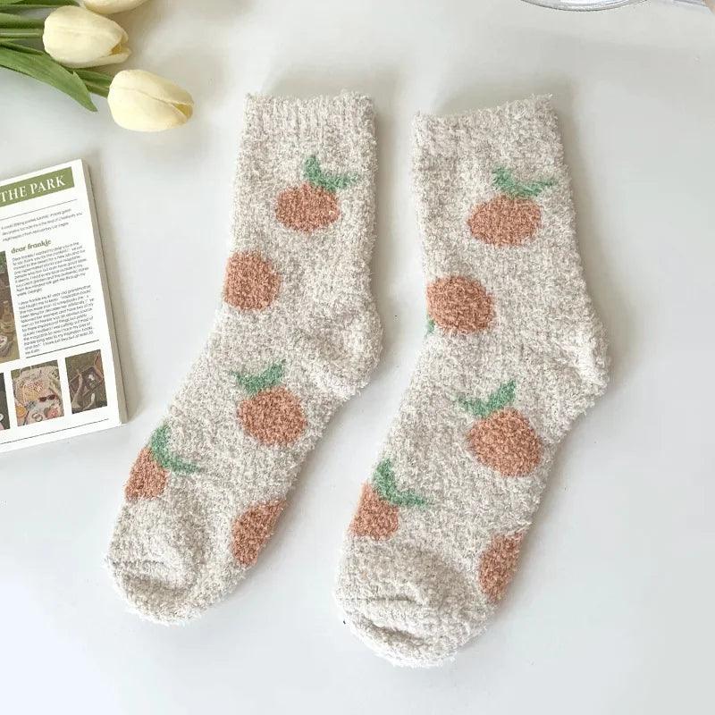 Soft plush sleeping socks, light gray with orange and green strawberry-like prints