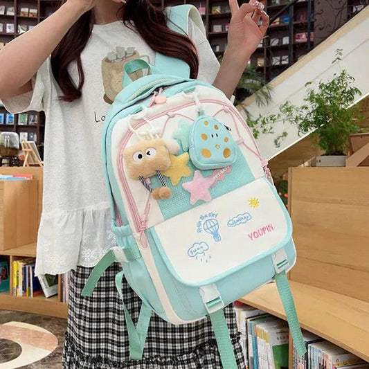 Mint teal 3-piece backpack set with character embroidery on the front and side pockets