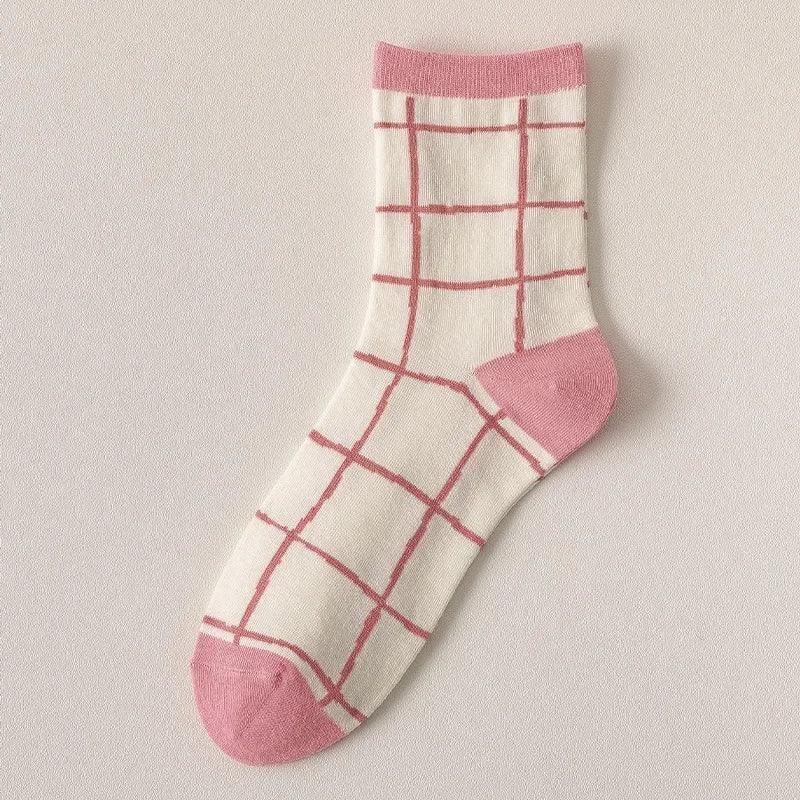 White socks with pink plaid grid pattern and pink heel and toe