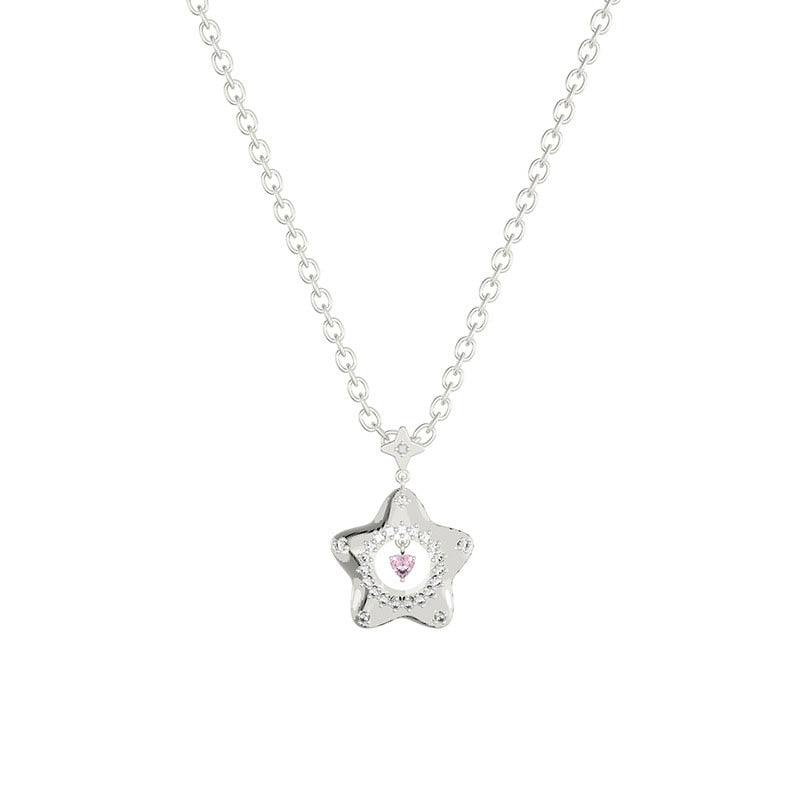 Silver chain necklace with star pendant featuring pink center gem and glittering details