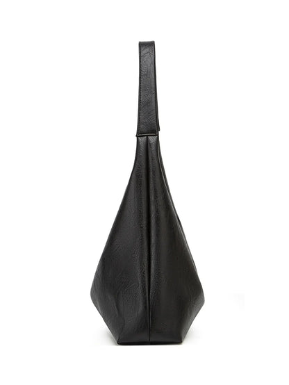 Black shoulder tote bag with long top handle and slouchy shape