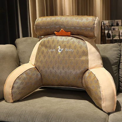 Textured plush reading pillow with wraparound arms and cream-and-brown animal face